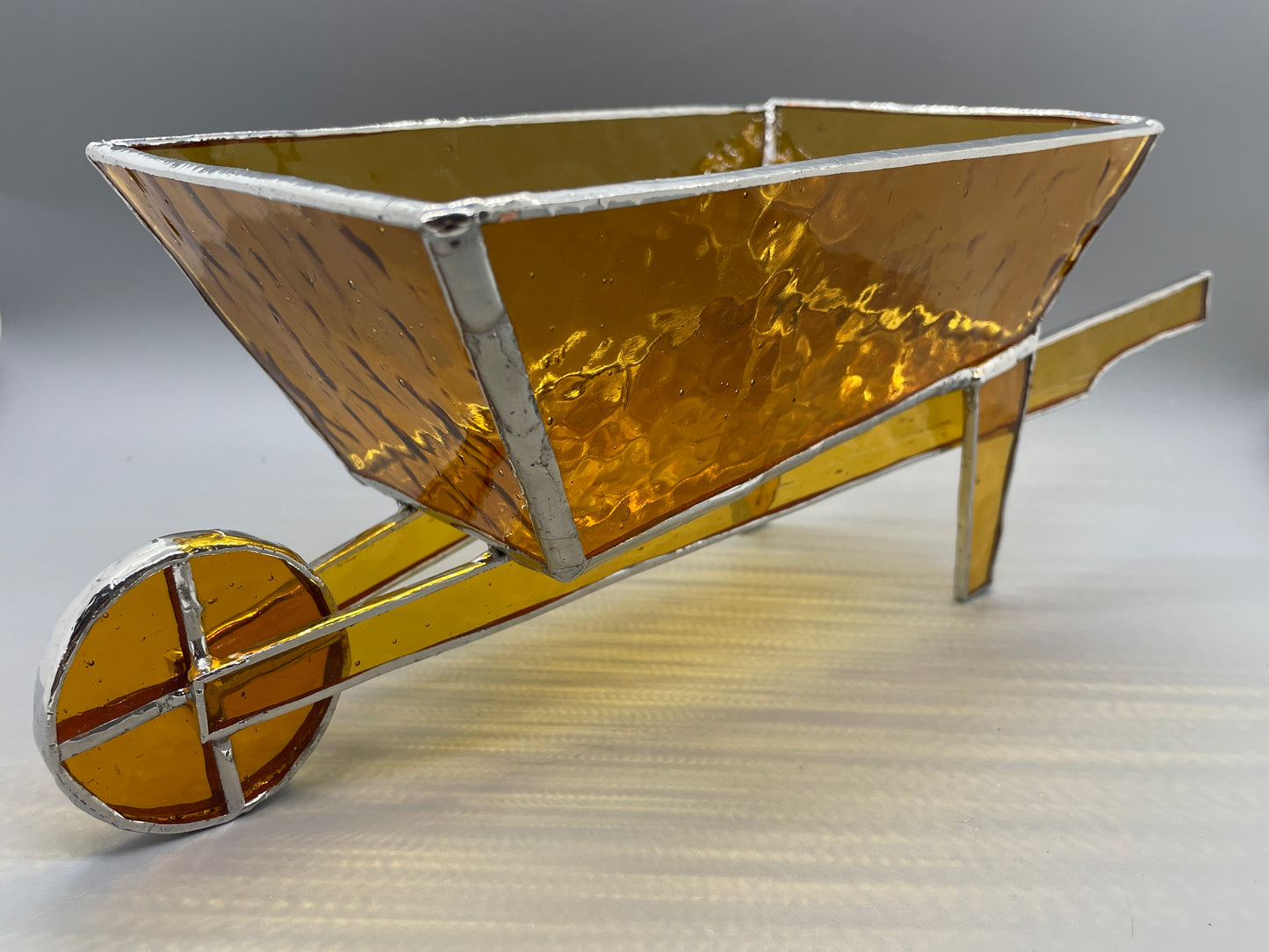 Amber Glass Wheelbarrow Sculpture