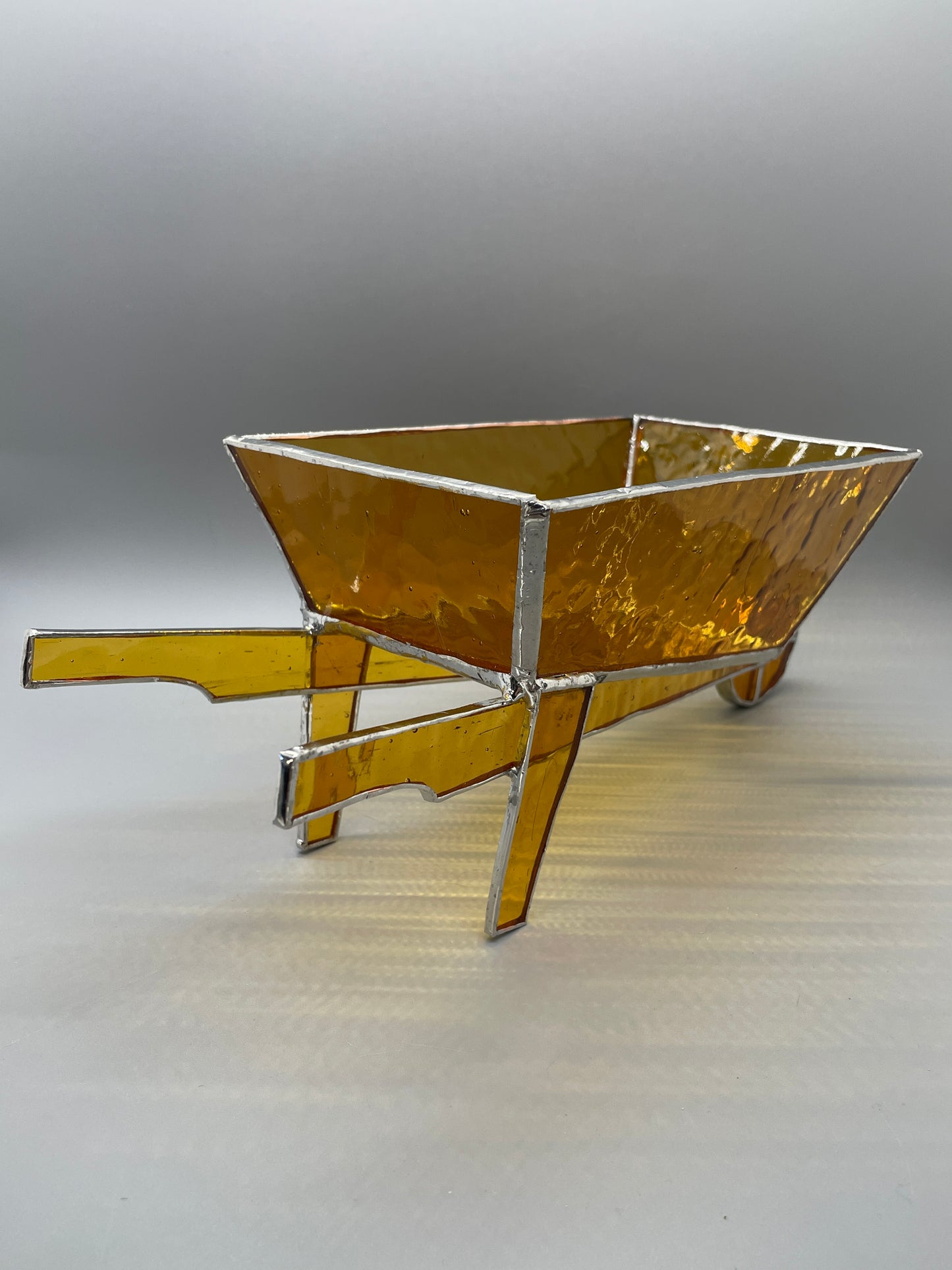 Amber Glass Wheelbarrow Sculpture